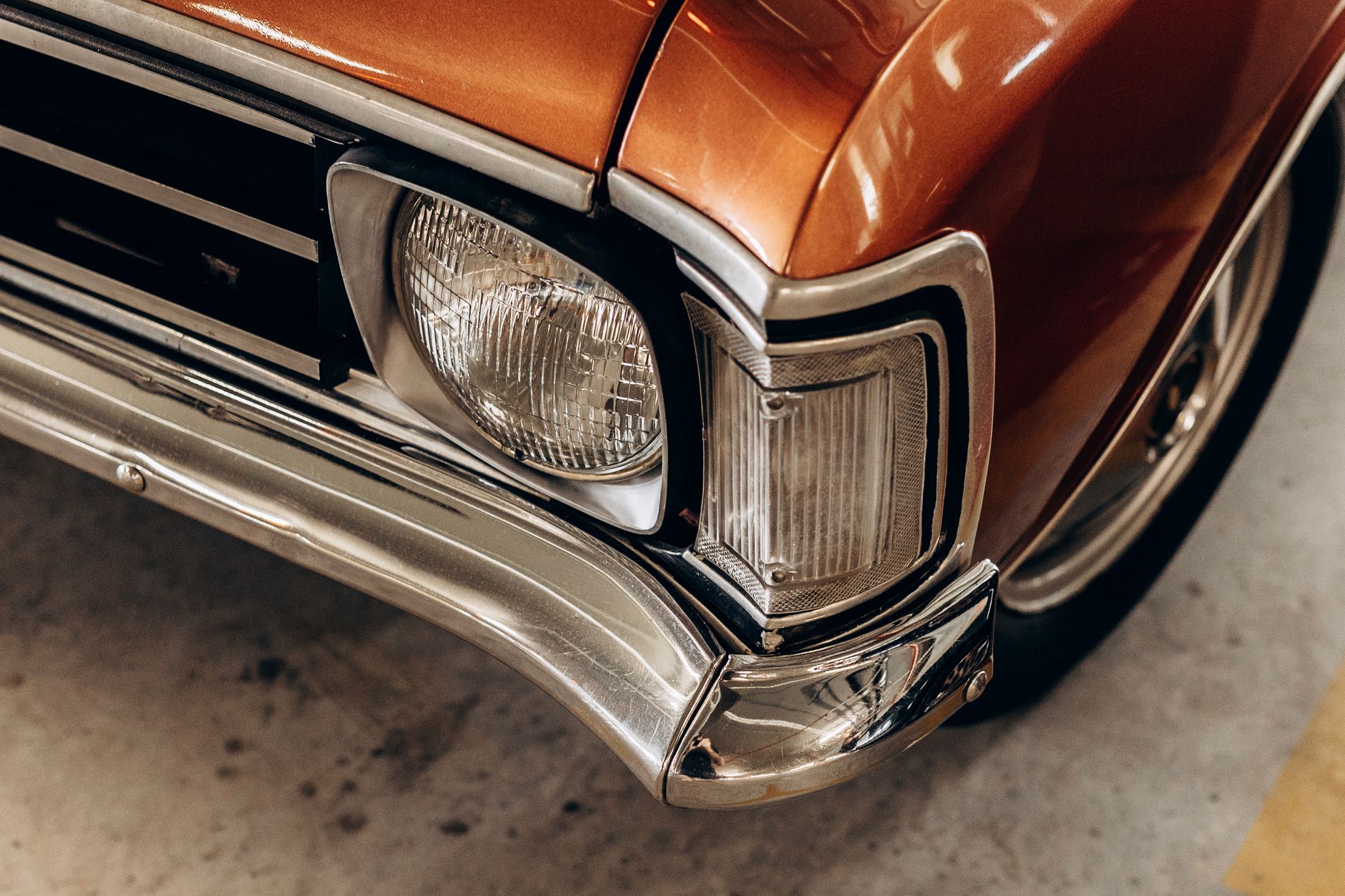 Polished chrome headlight and bumper detail