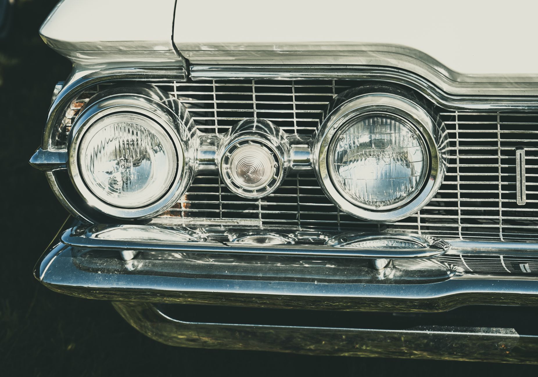 Polished chrome grille and headlight detail